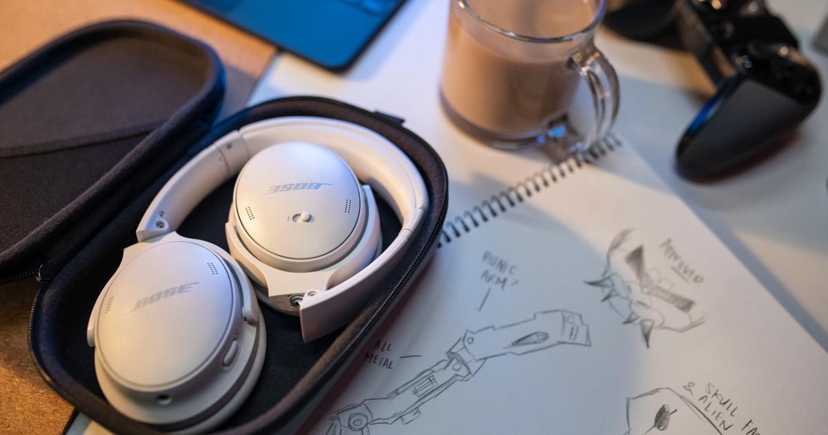 The QC45 laid in its open carrying case in Bose promotional photography.