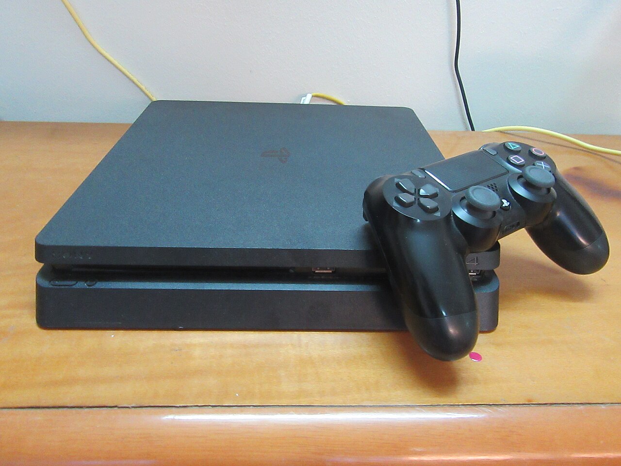 Sony PlayStation 4 Slim — manufacturer product photograph